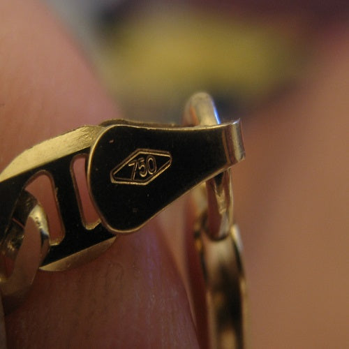 Your Unidentified Jewelry Stamp Questions Answered